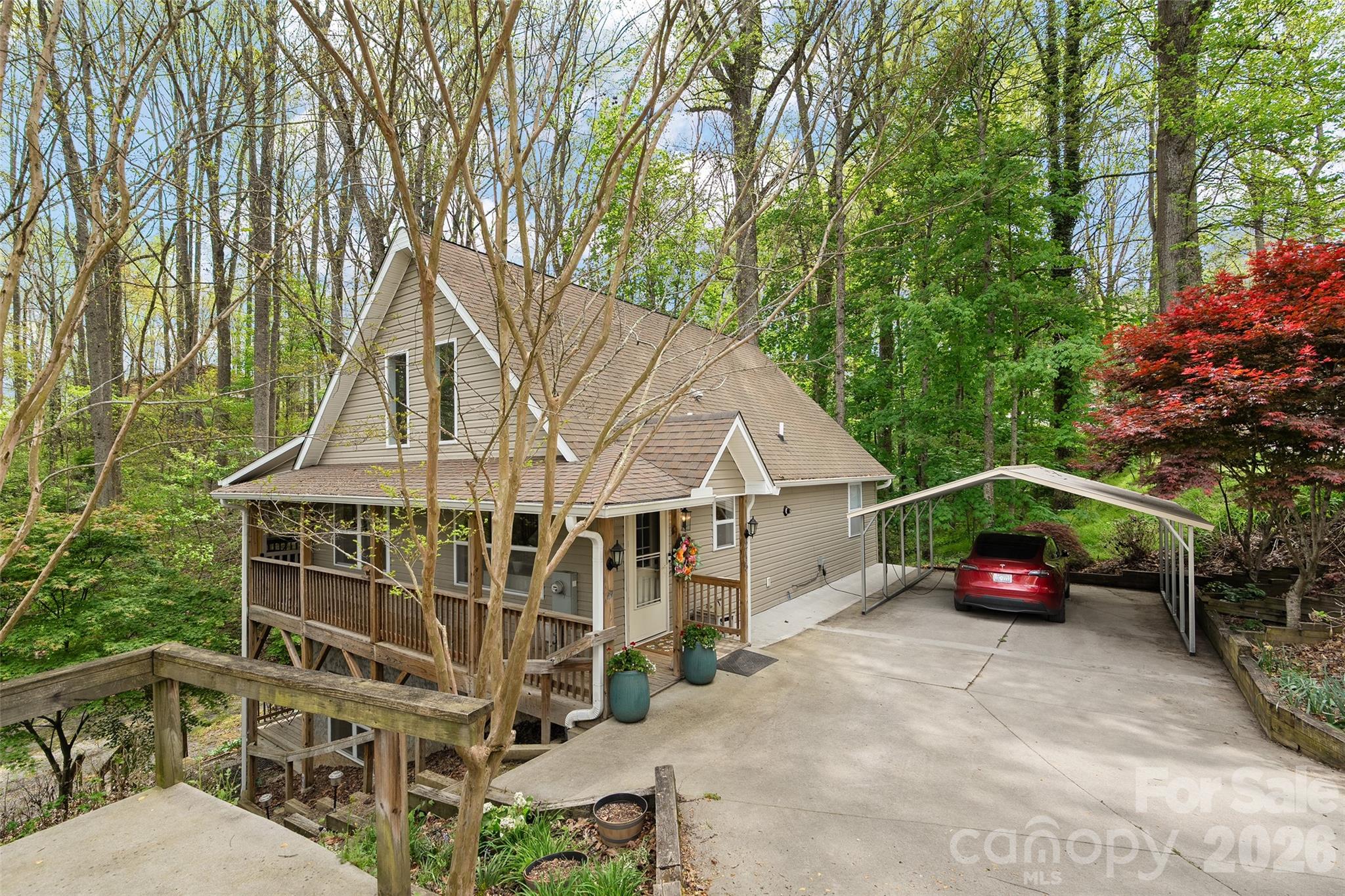 215 Atkins Loop Lake Junaluska, NC 28745 - Photo 1 of 44 a view of a house with a yard