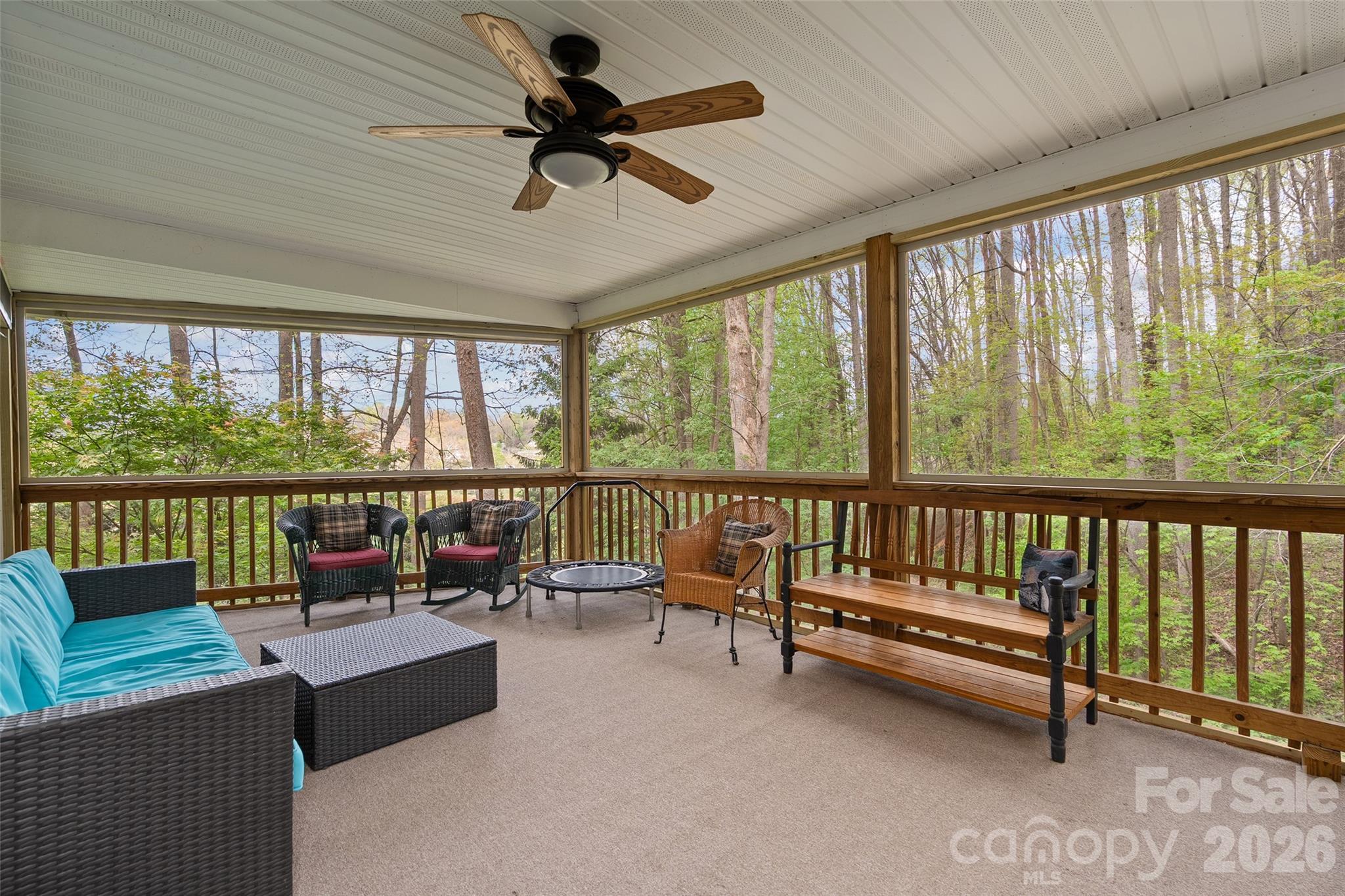 215 Atkins Loop Lake Junaluska, NC 28745 - Photo 12 of 44 a living room with furniture and a large window