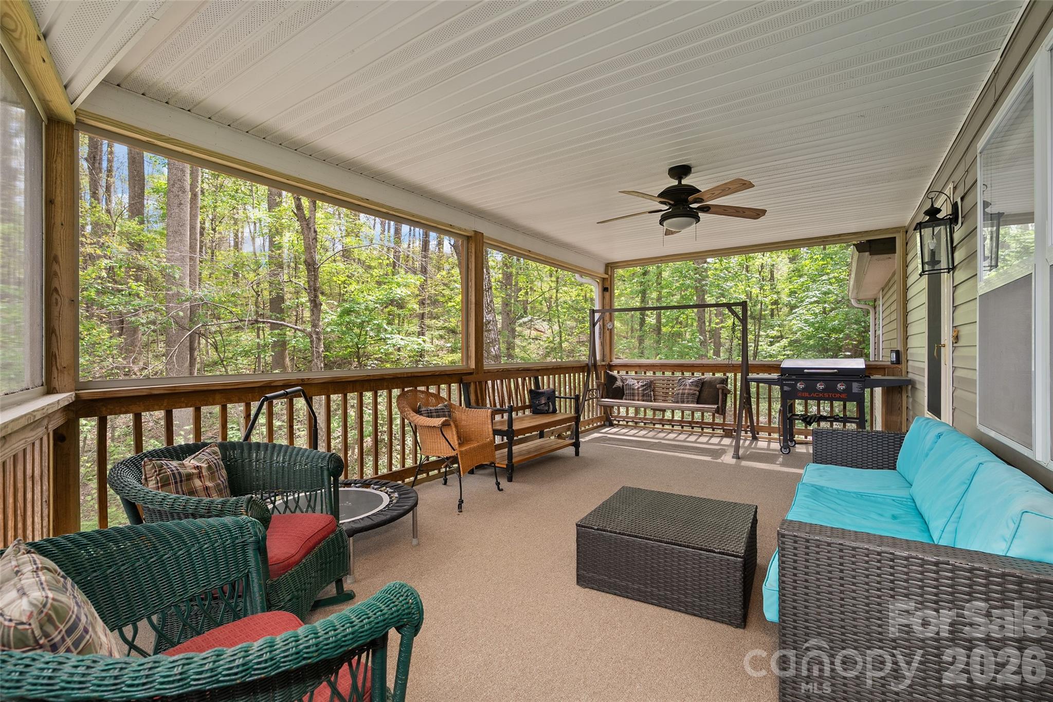 215 Atkins Loop Lake Junaluska, NC 28745 - Photo 13 of 44 a living room with furniture and a large window