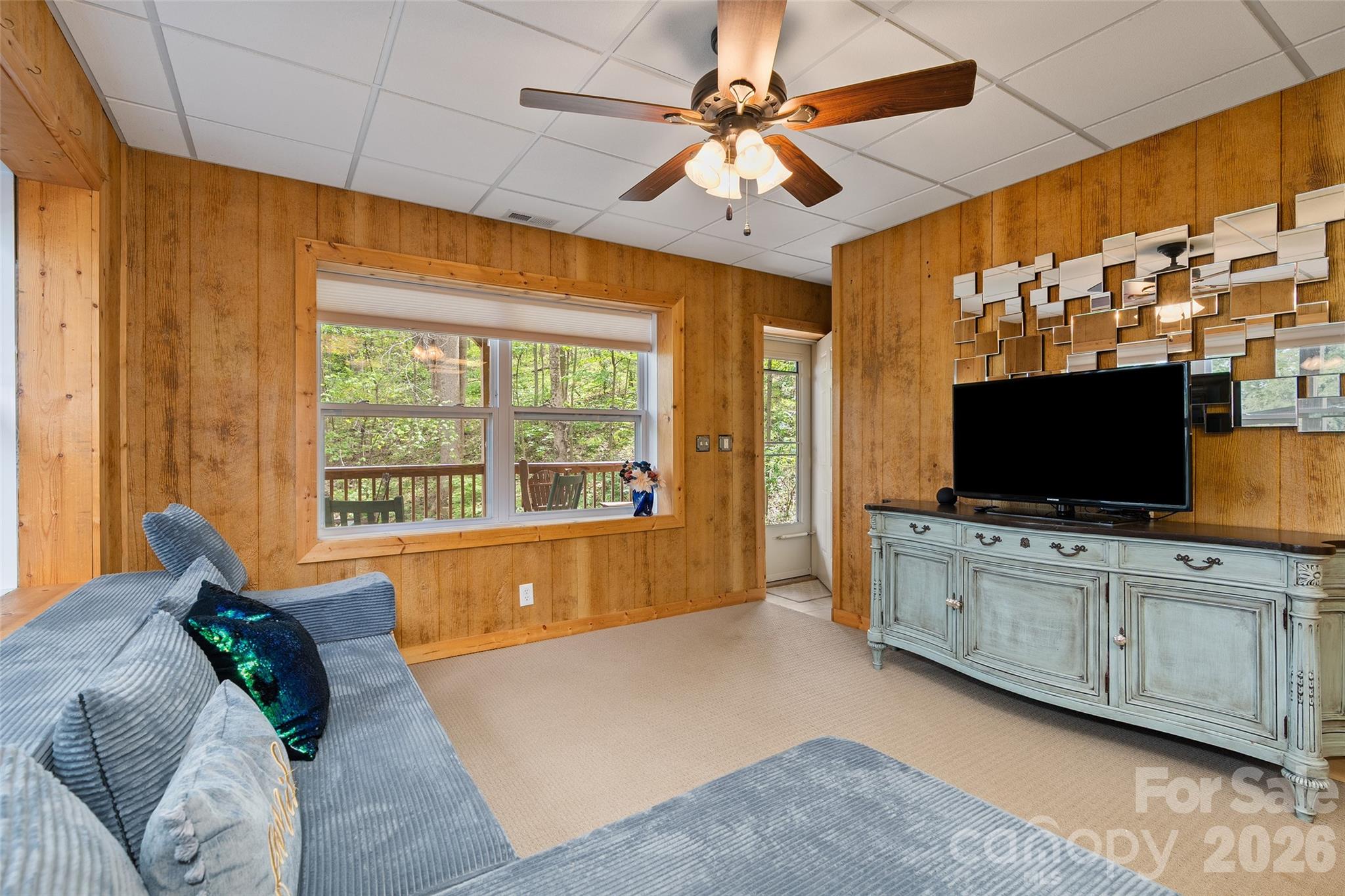 215 Atkins Loop Lake Junaluska, NC 28745 - Photo 28 of 44 a living room with furniture and a flat screen tv