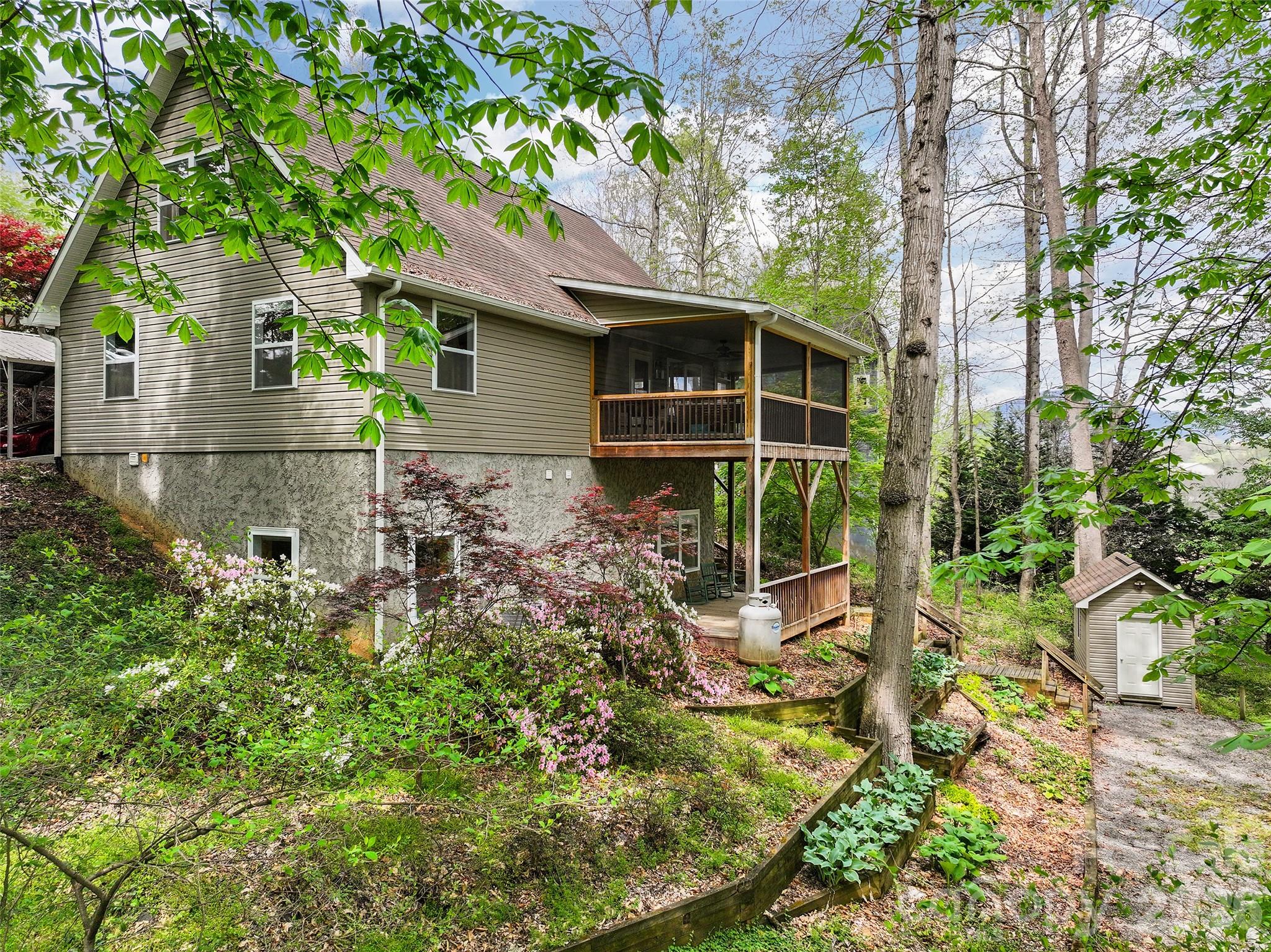 215 Atkins Loop Lake Junaluska, NC 28745 - Photo 39 of 44 a backyard of a house with lots of green space