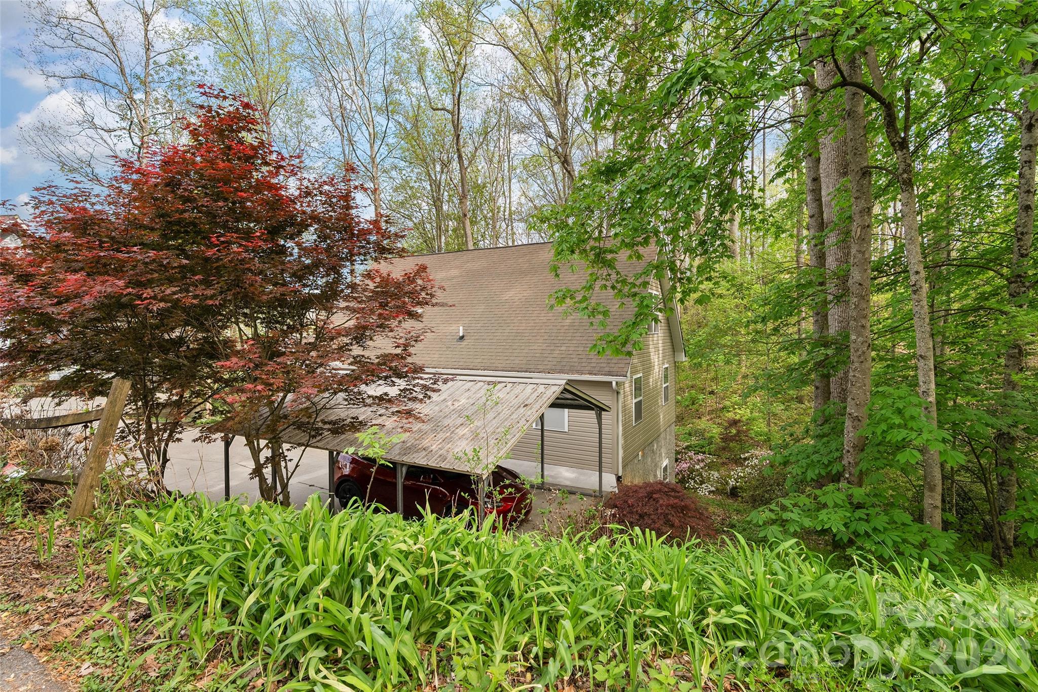 215 Atkins Loop Lake Junaluska, NC 28745 - Photo 42 of 44 front view of a house with a yard and fountain