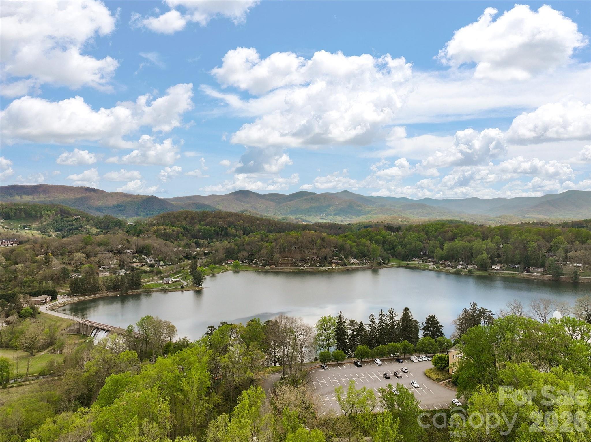 215 Atkins Loop Lake Junaluska, NC 28745 - Photo 44 of 44 a view of a lake with houses in the back