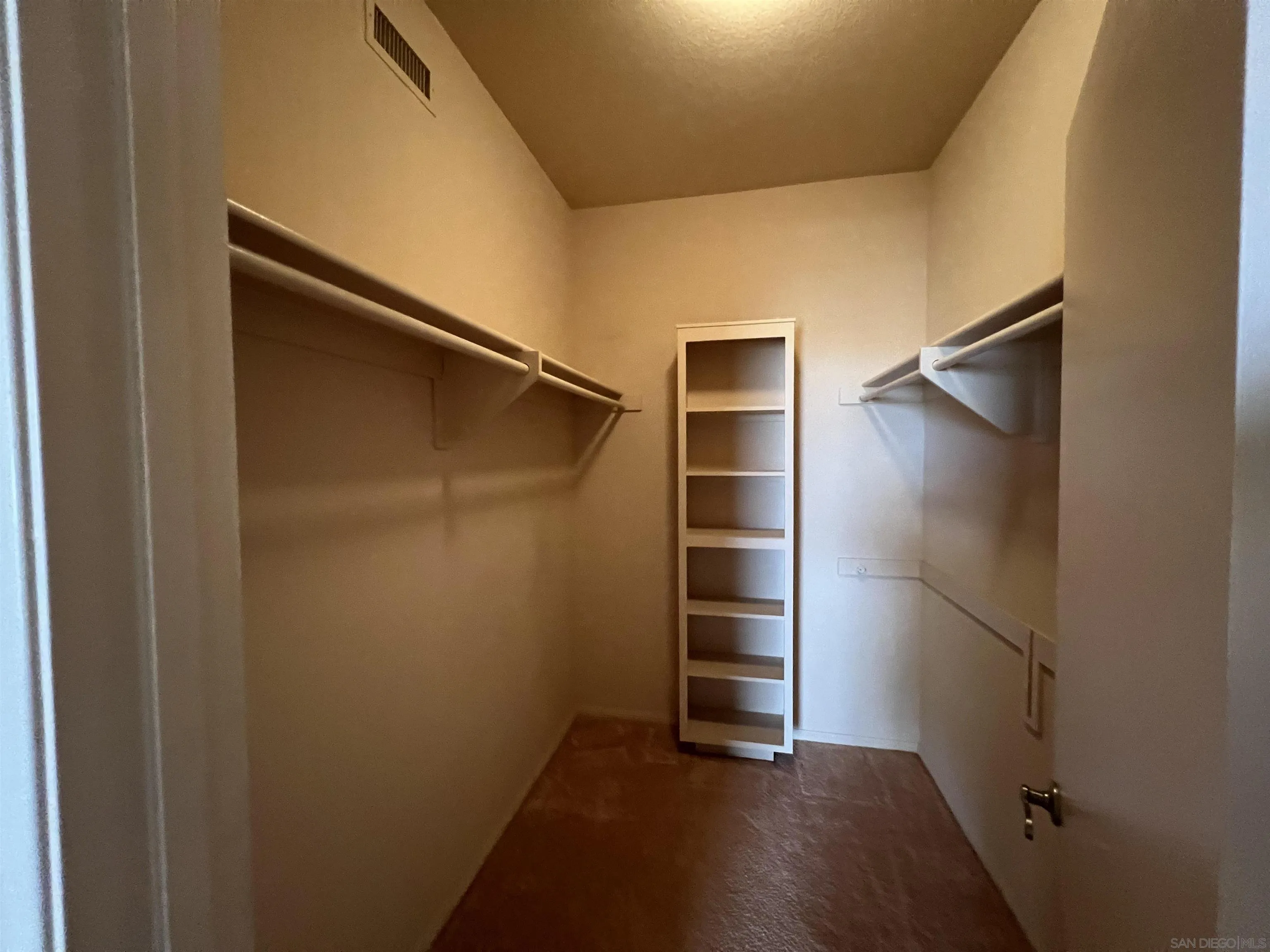 4683 Desert Vista Drive Borrego Springs, CA 92004 - Photo 19 of 32 a view of walk in closet with empty racks