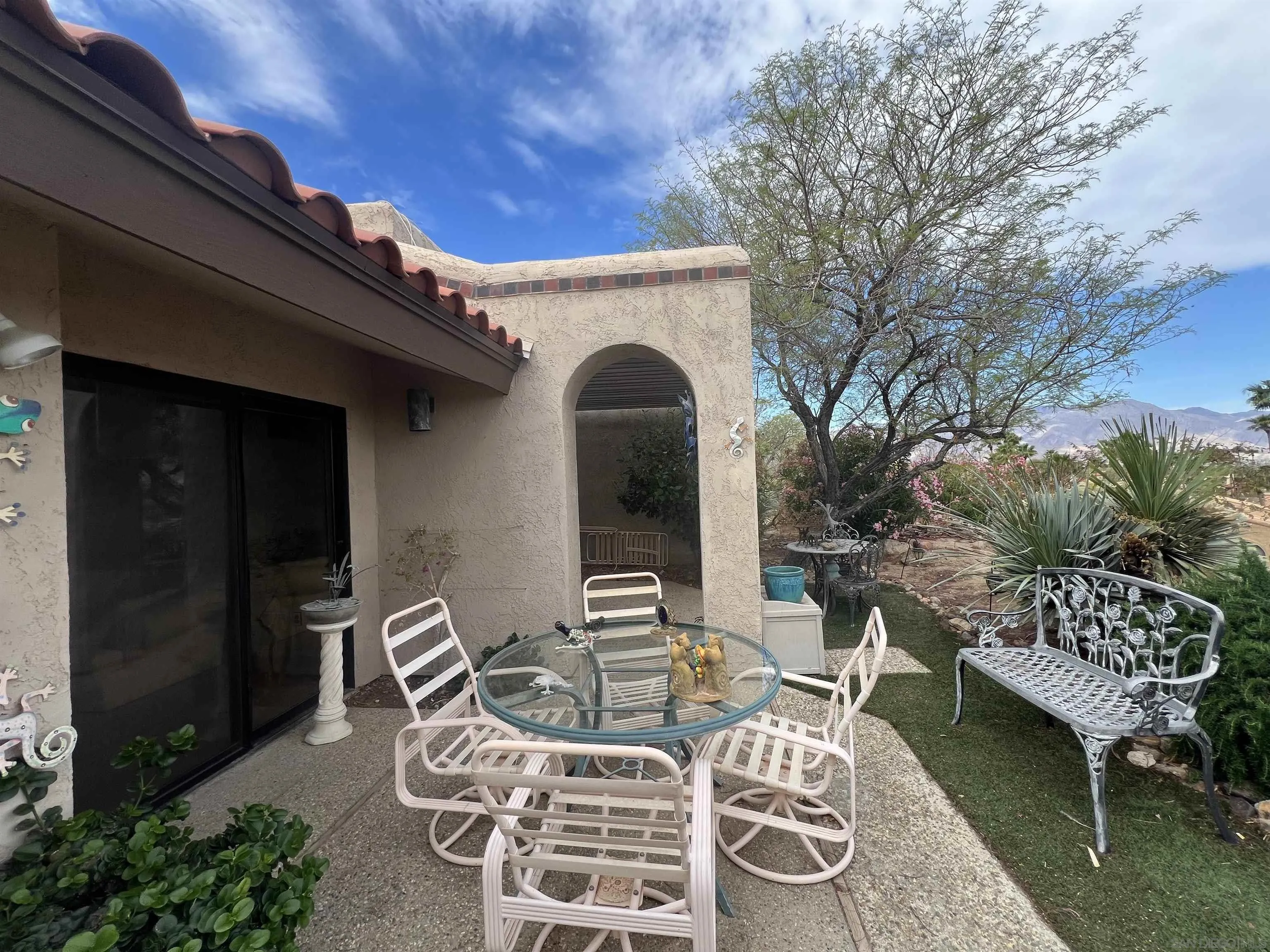 4683 Desert Vista Drive Borrego Springs, CA 92004 - Photo 22 of 32 a view of a chairs and table in backyard