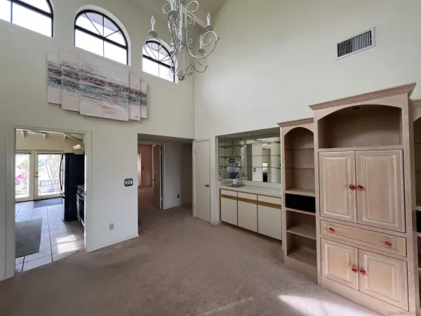 a view of living room and patio