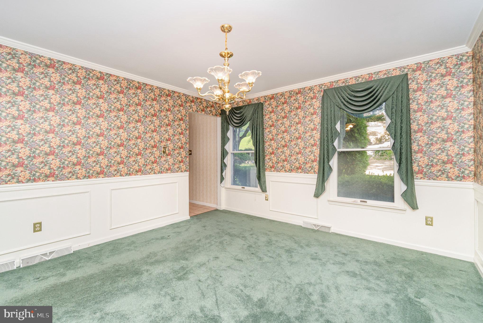 25 Estates Drive Reading, PA 19606 - Photo 13 of 43 a view of a big room with windows and chandelier