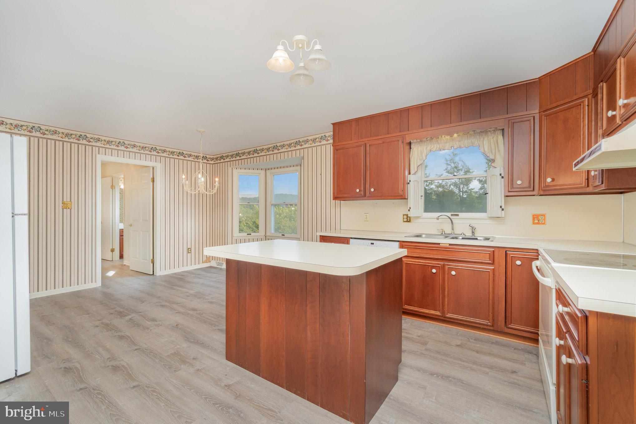 25 Estates Drive Reading, PA 19606 - Photo 2 of 43 a kitchen with stainless steel appliances granite countertop a sink stove and refrigerator