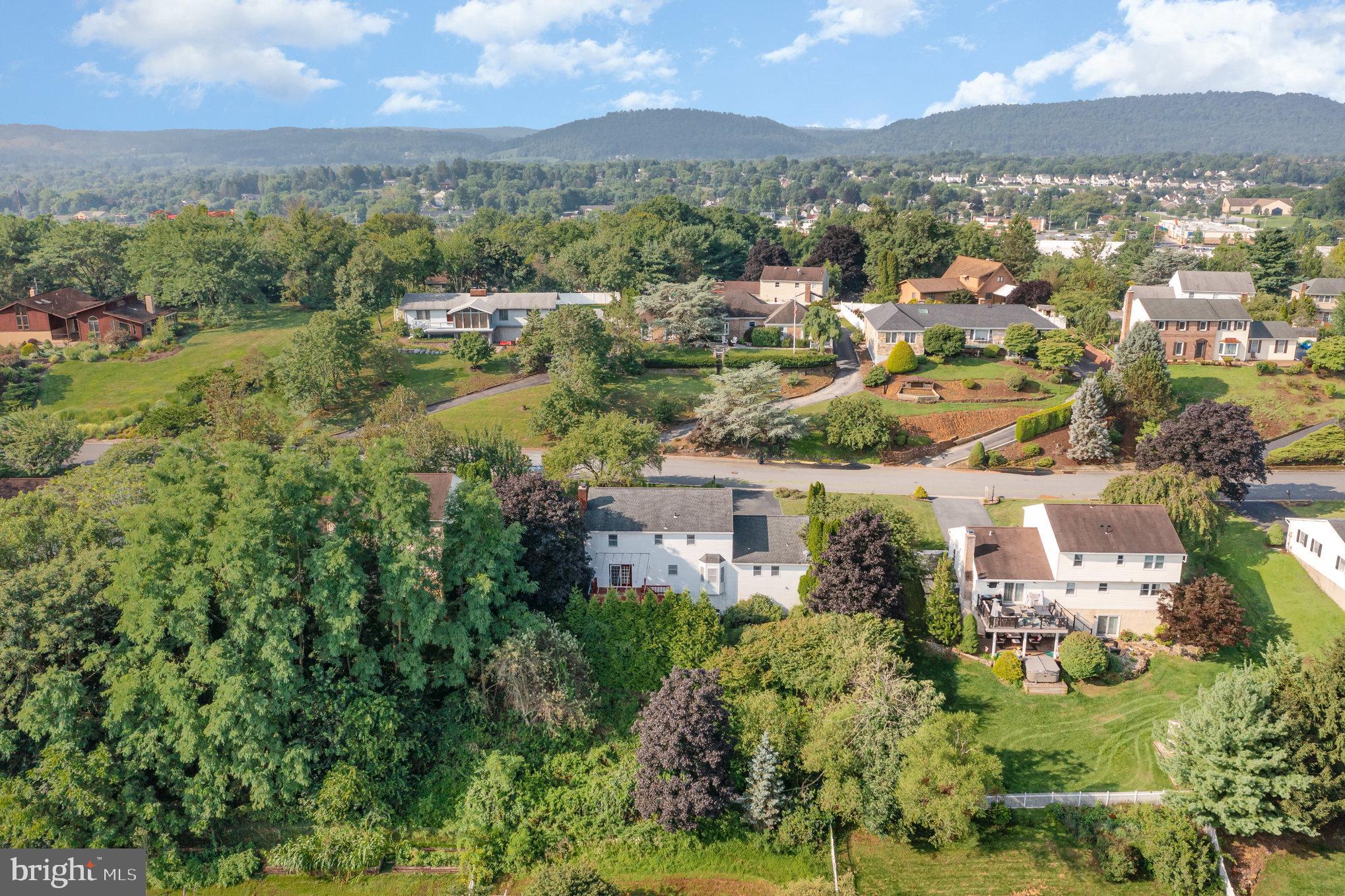 25 Estates Drive Reading, PA 19606 - Photo 40 of 43 an aerial view of residential houses with outdoor space and trees