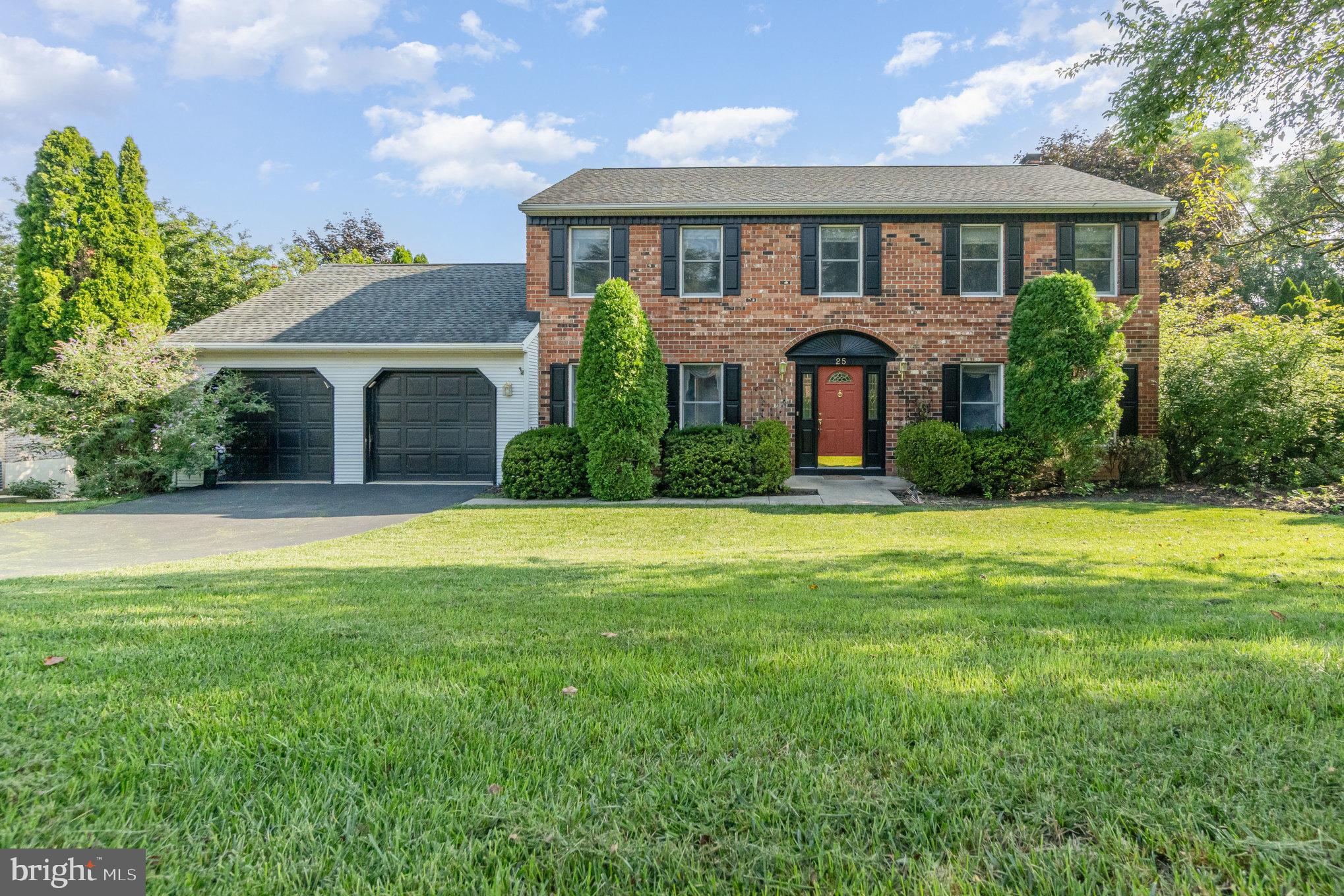 25 Estates Drive Reading, PA 19606 - Photo 43 of 43 a front view of a house with a yard and garage