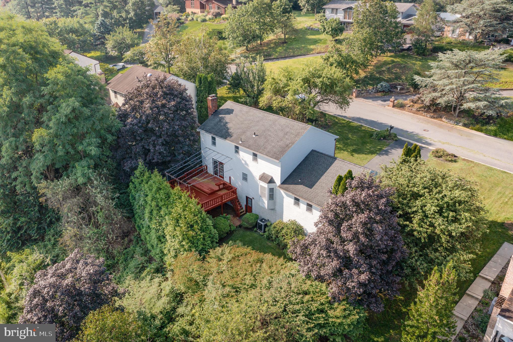 25 Estates Drive Reading, PA 19606 - Photo 5 of 43 an aerial view of house with yard and mountain view in back