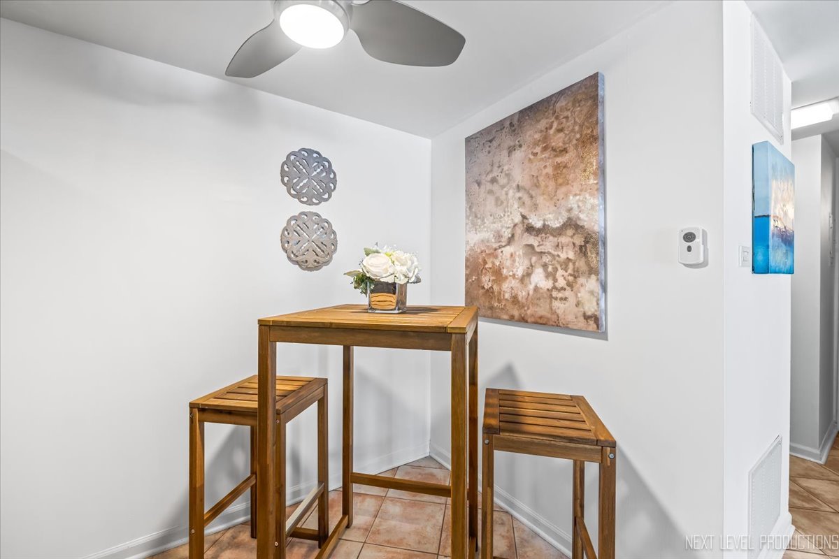 127 North Wolf Road, Unit 60A Wheeling, IL 60090 - Photo 8 of 22 a view of staircase with wooden door