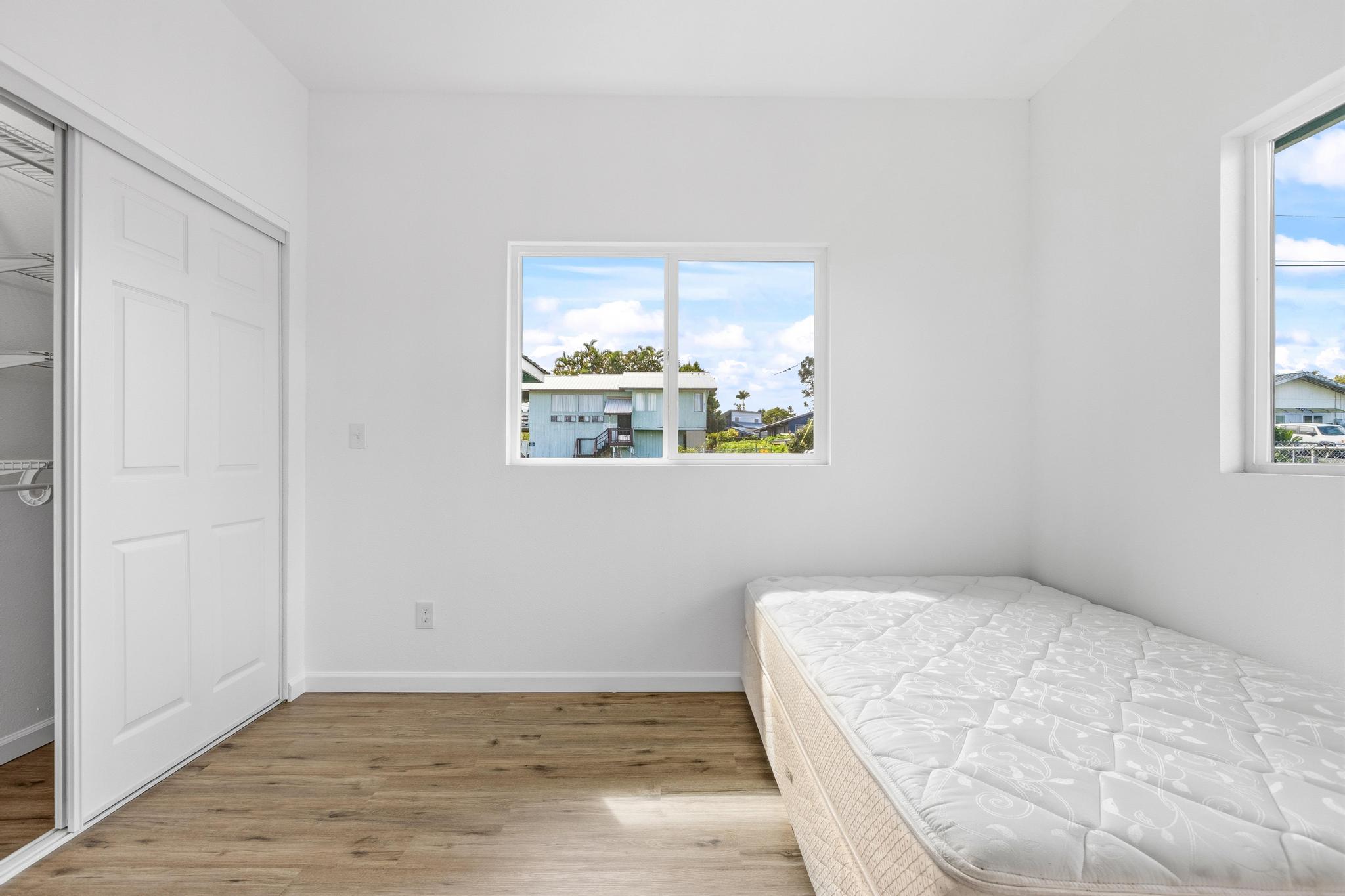 18-7842 Kaniela Road Mountain View, HI 96771 - Photo 20 of 30 an empty room with a window