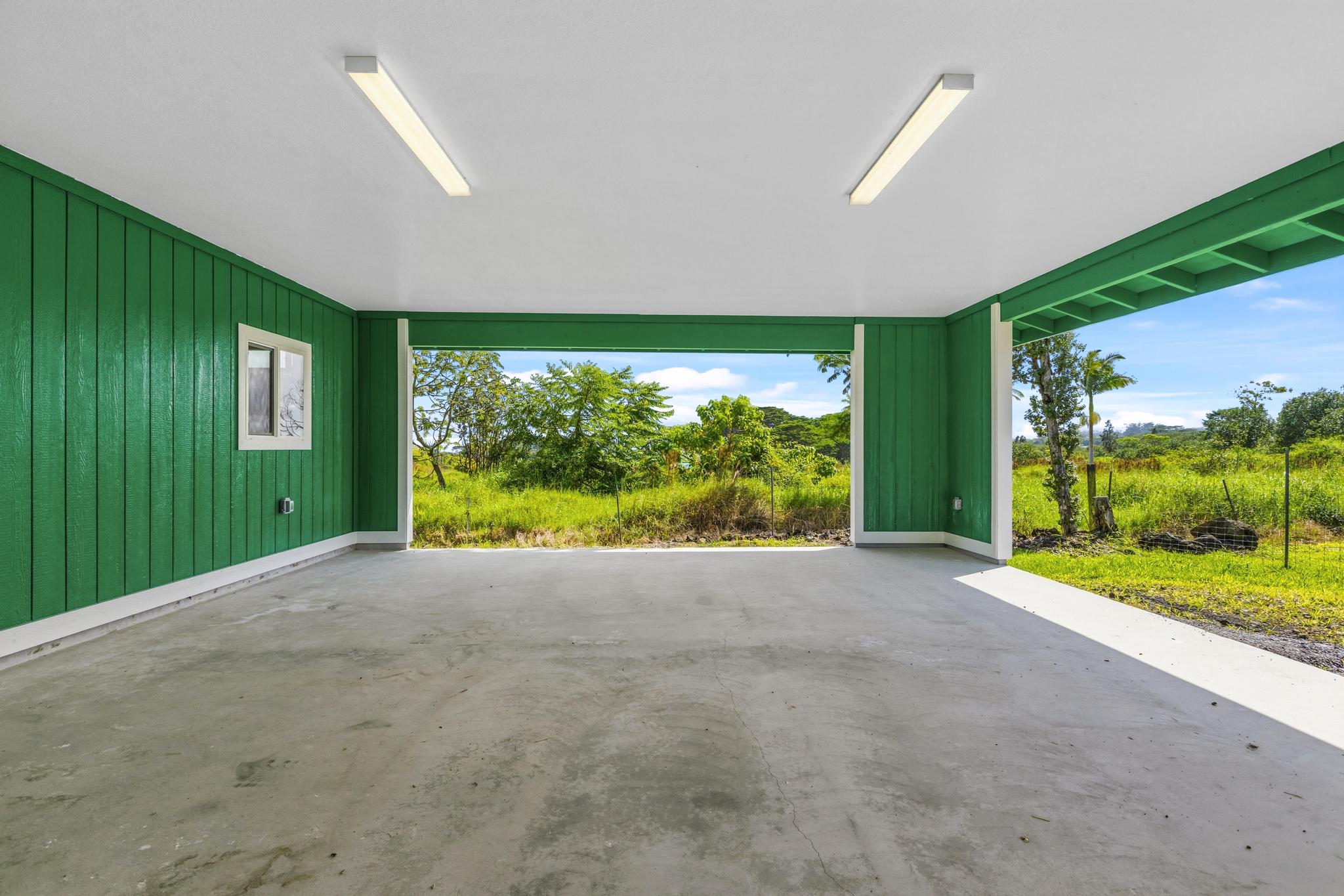 18-7842 Kaniela Road Mountain View, HI 96771 - Photo 5 of 30 a view of a yard with porch