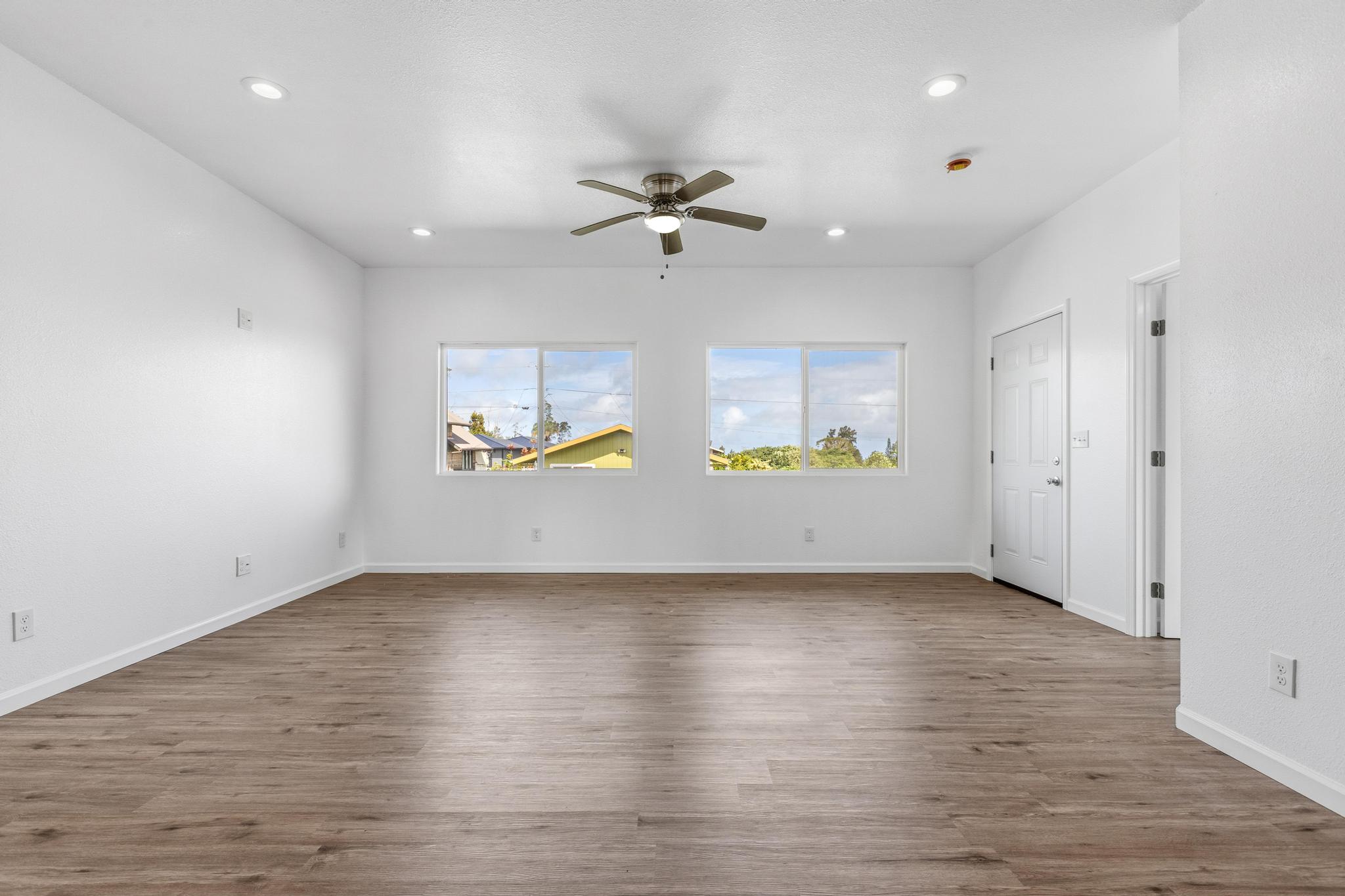 18-7842 Kaniela Road Mountain View, HI 96771 - Photo 8 of 30 an empty room with a empty space and windows