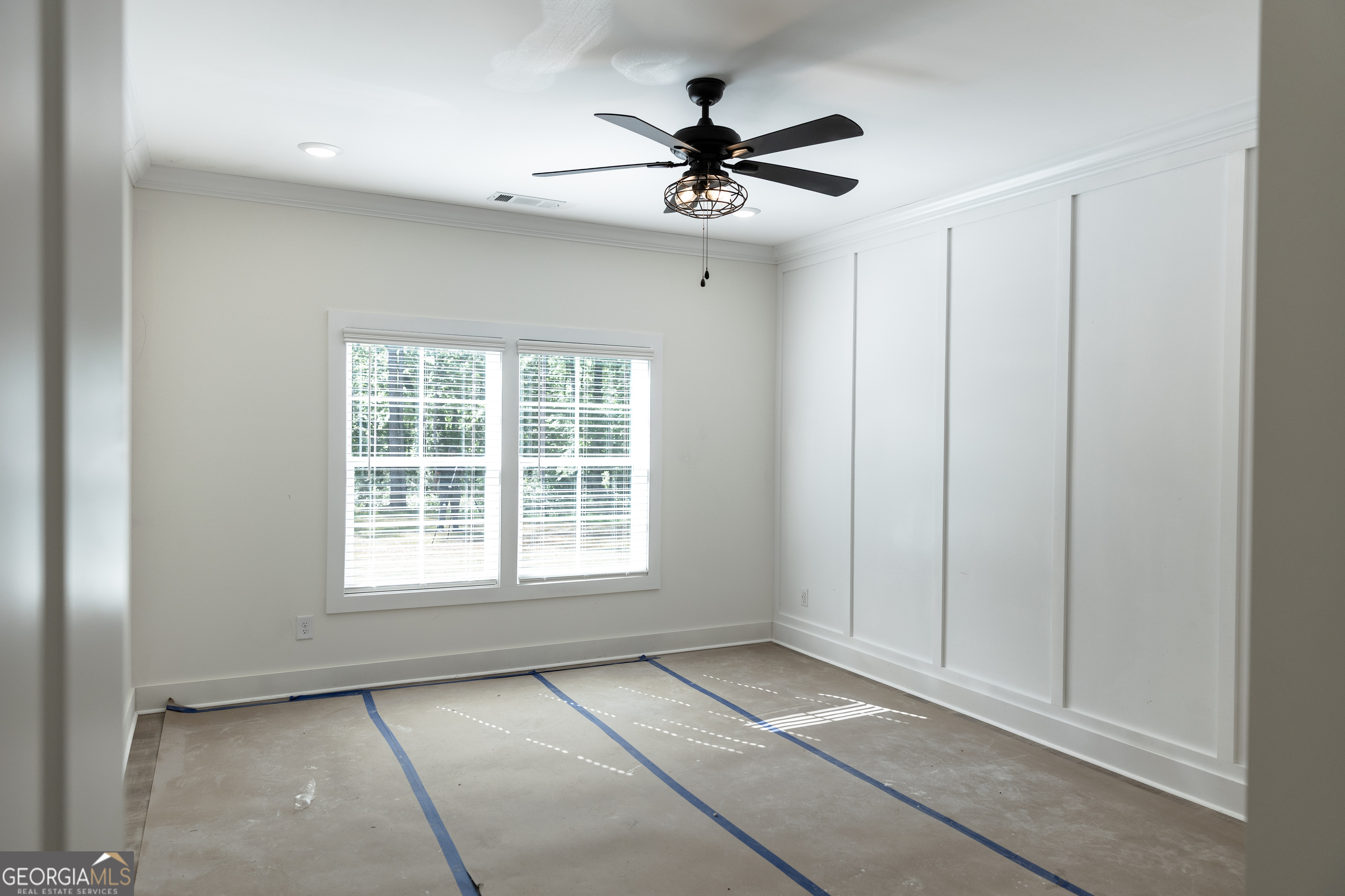 632 Campbell Road Covington, GA 30014 - Photo 17 of 60 a view of an empty room with a window