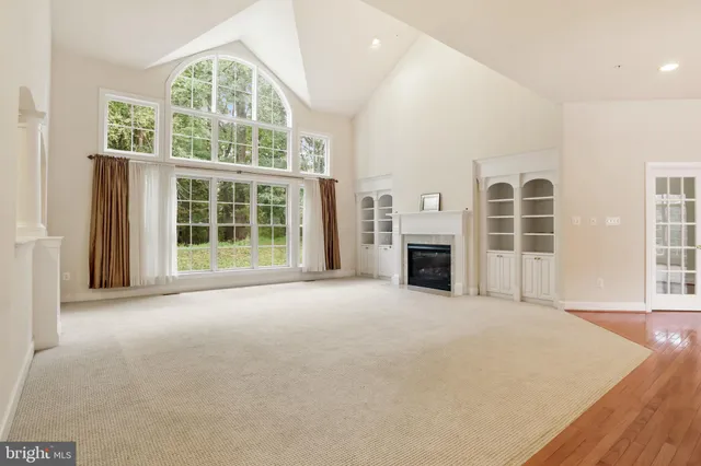 a kitchen with stainless steel appliances granite countertop a stove and a microwave