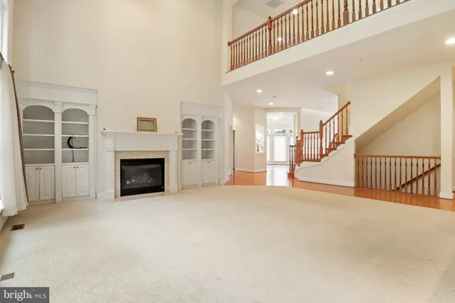 a large kitchen with stainless steel appliances granite countertop a large counter top and stove