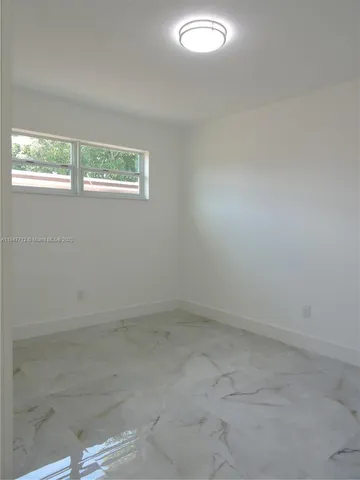 an empty room with closet