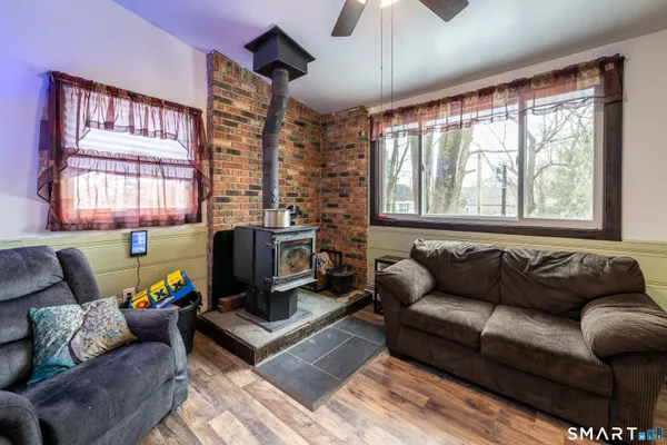a living room with furniture and a window