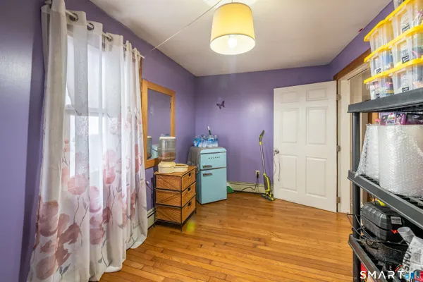a room with furniture and a window