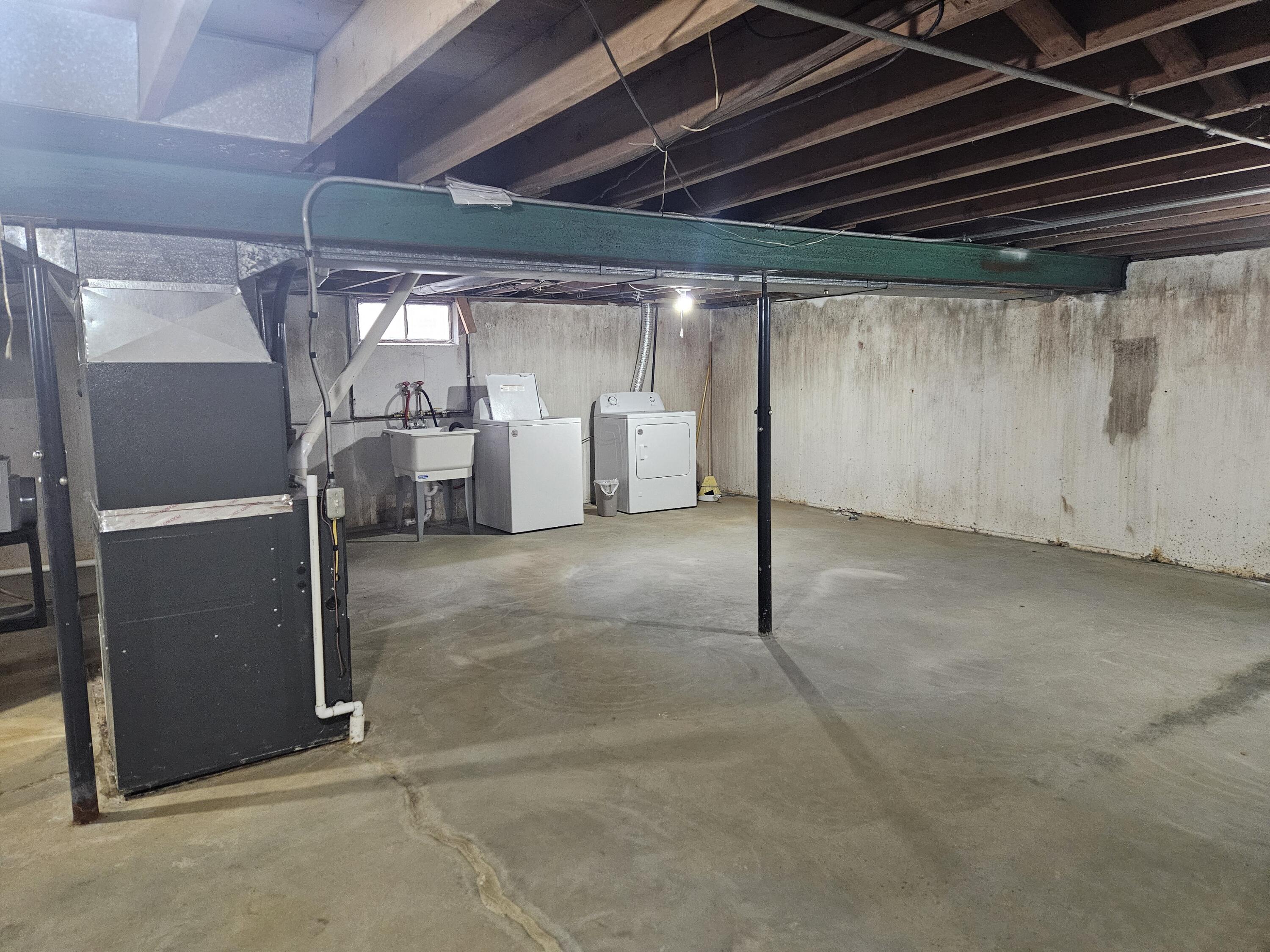 309 Redpath Avenue Michigan City, IN 46360 - Photo 17 of 27 a view of a room with wooden walls