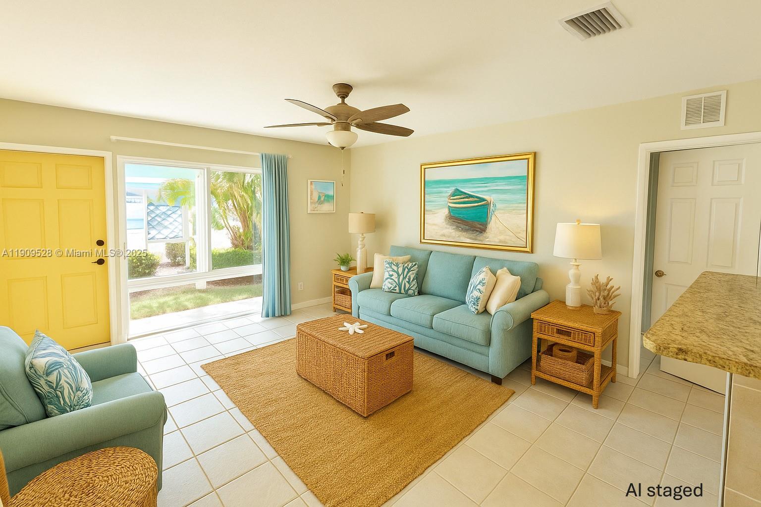 3217 Northeast 7th Place, Unit 1 Pompano Beach, FL 33062 - Photo 4 of 28 a living room with furniture and a large window
