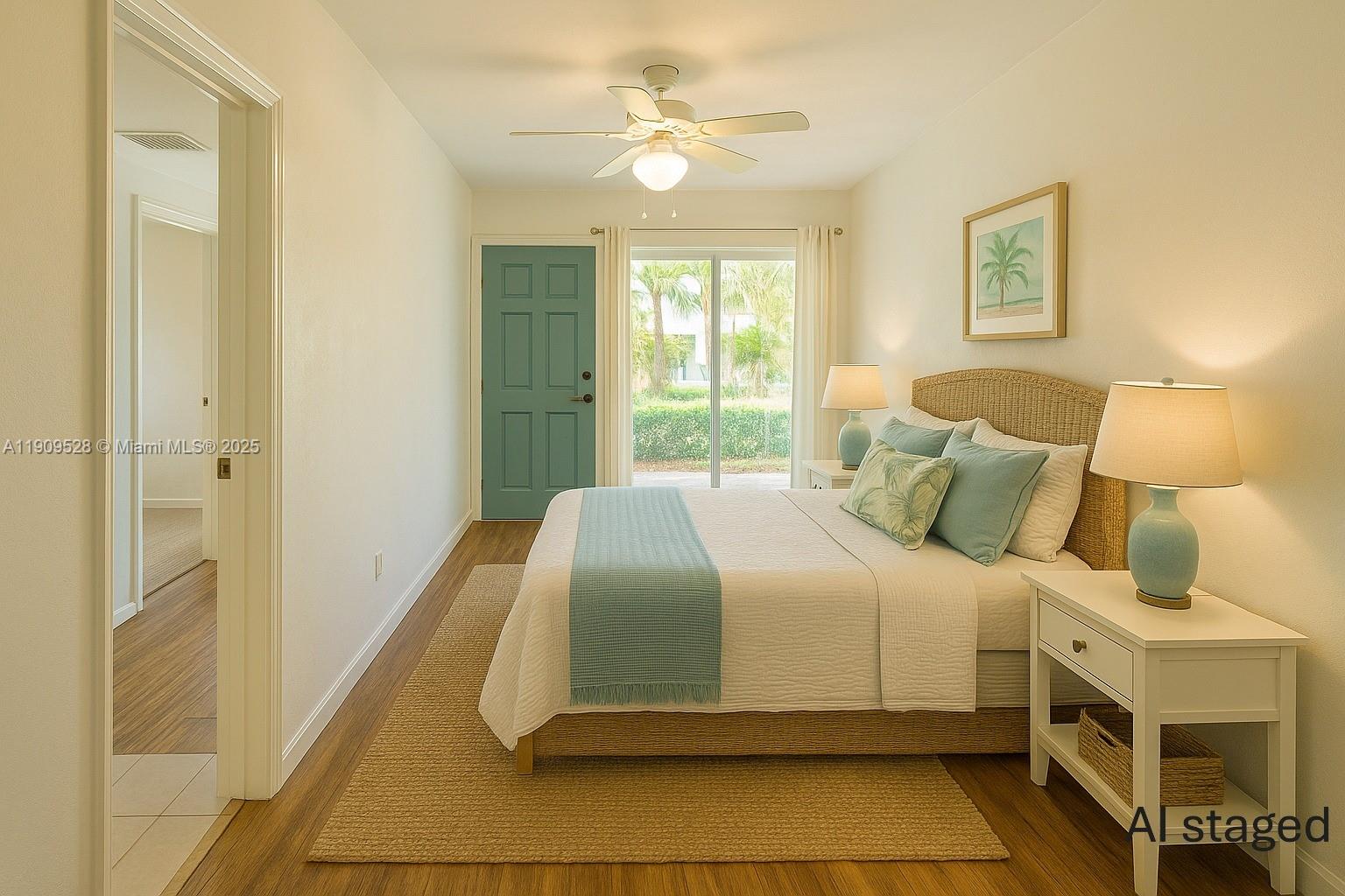 3217 Northeast 7th Place, Unit 1 Pompano Beach, FL 33062 - Photo 6 of 28 a bedroom with a bed and a chandelier