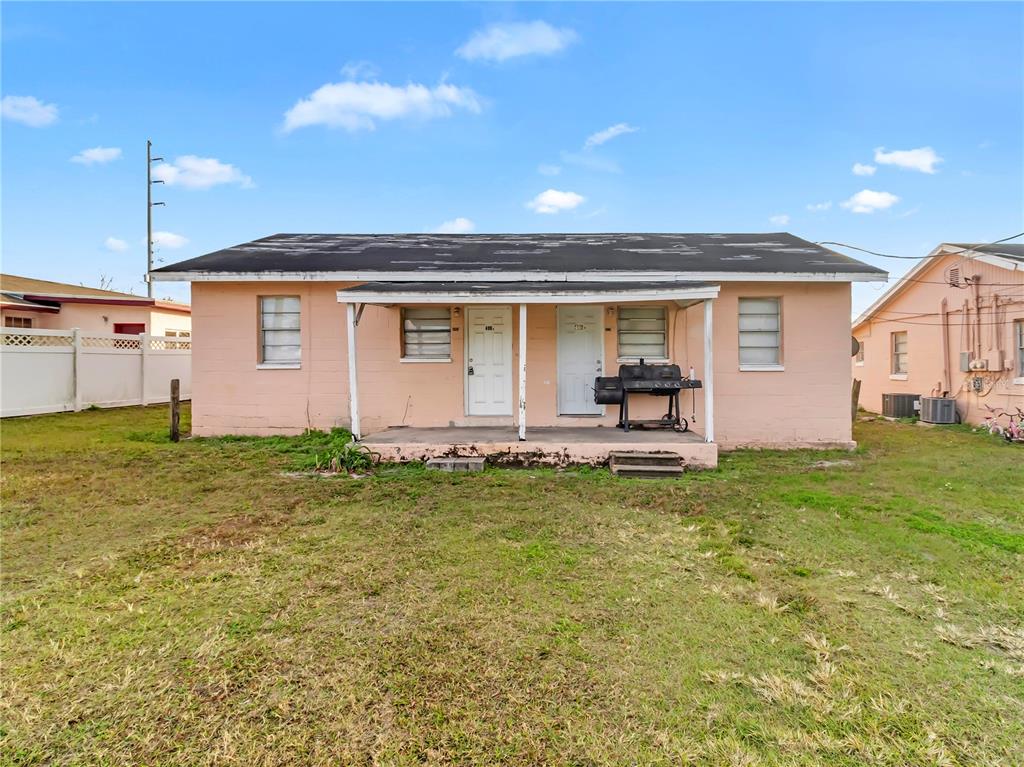 301 Southwest 3rd Terrace Mulberry, FL 33860 - Photo 27 of 39 a house view with a garden space