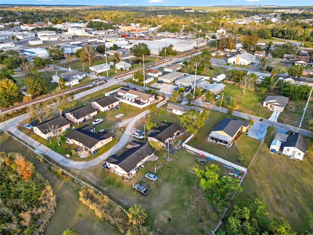 301 Southwest 3rd Terrace Mulberry, FL 33860 - Photo 3 of 39 an aerial view of residential houses with outdoor space