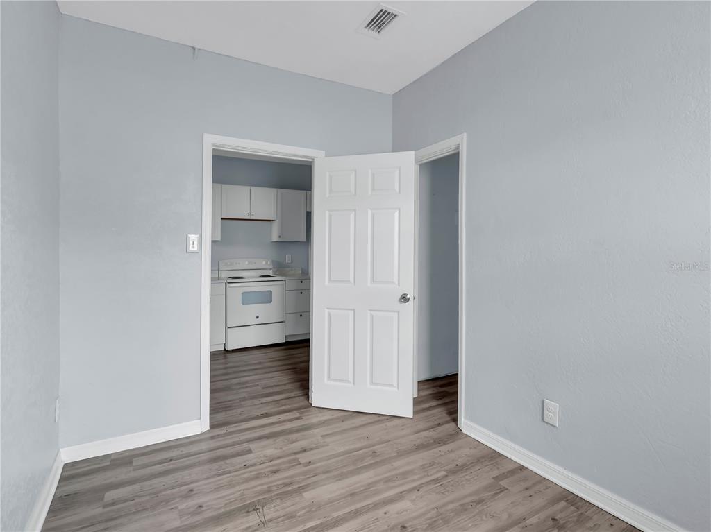 301 Southwest 3rd Terrace Mulberry, FL 33860 - Photo 36 of 39 a view of empty room with wooden floor