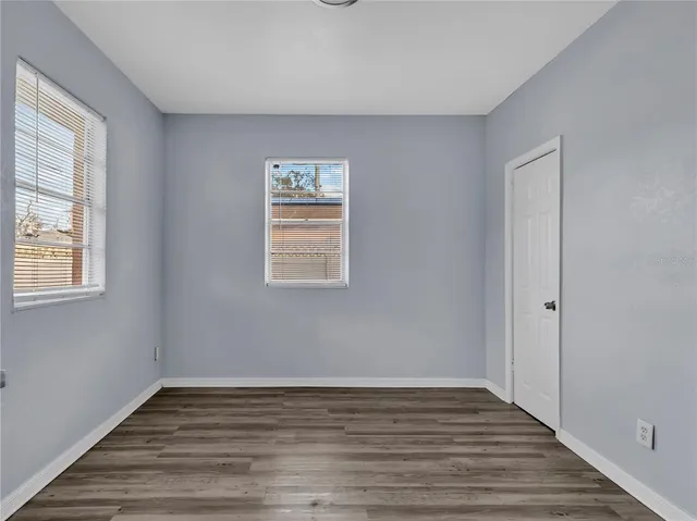 a picture of a bathroom with a shower