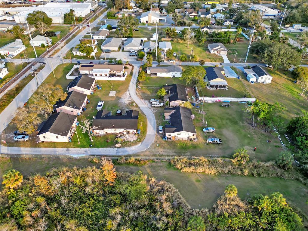 301 Southwest 3rd Terrace Mulberry, FL 33860 - Photo 4 of 39 an aerial view of residential houses with outdoor space and swimming pool