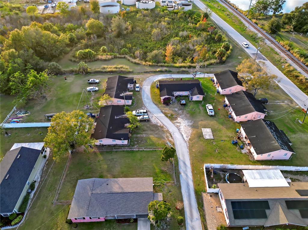 301 Southwest 3rd Terrace Mulberry, FL 33860 - Photo 9 of 39 an aerial view of house with yard swimming pool and outdoor seating