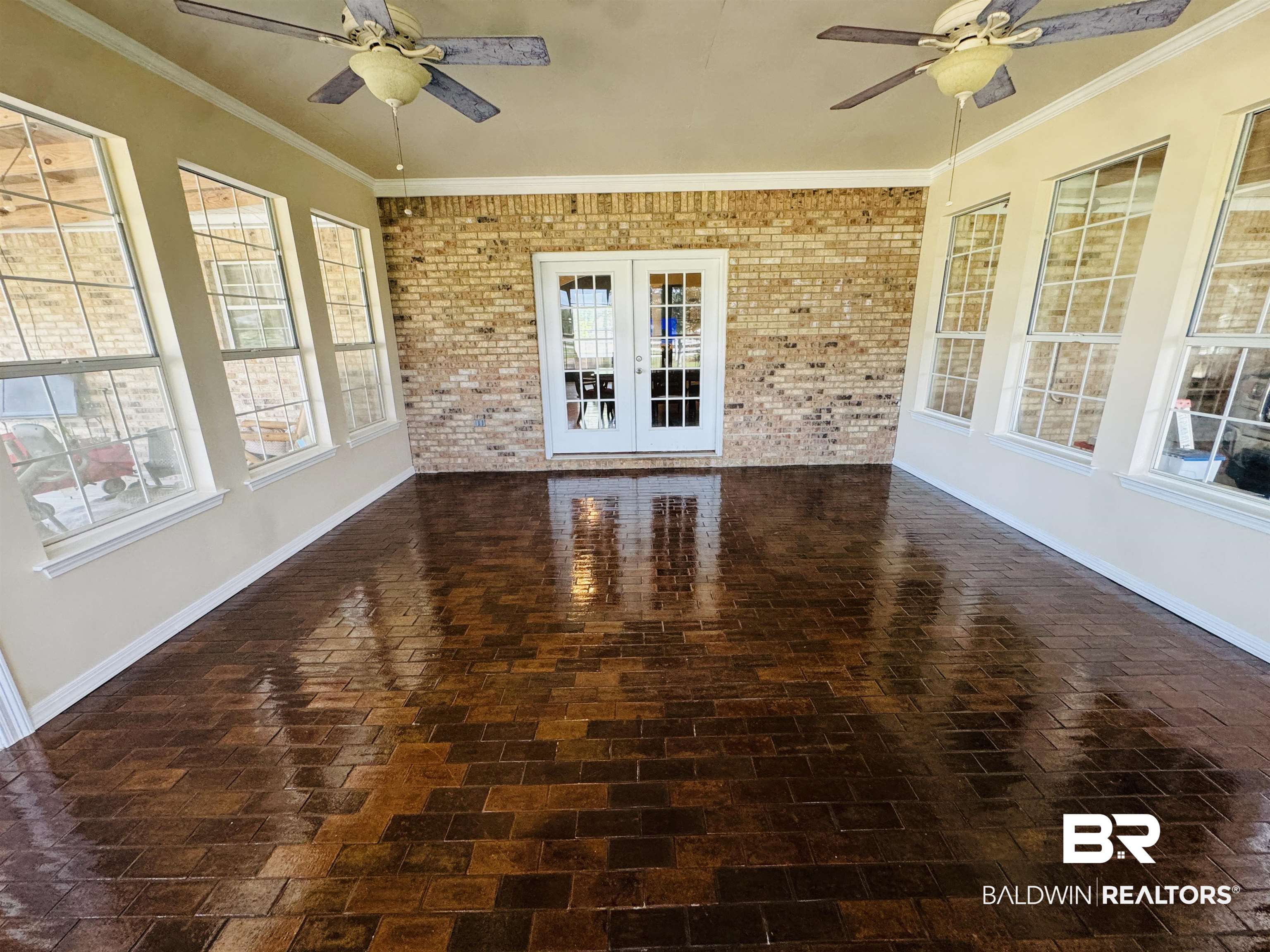 13795 White Road Silverhill, AL 36576 - Photo 41 of 99 Unfurnished sunroom with a ceiling fan and french doors