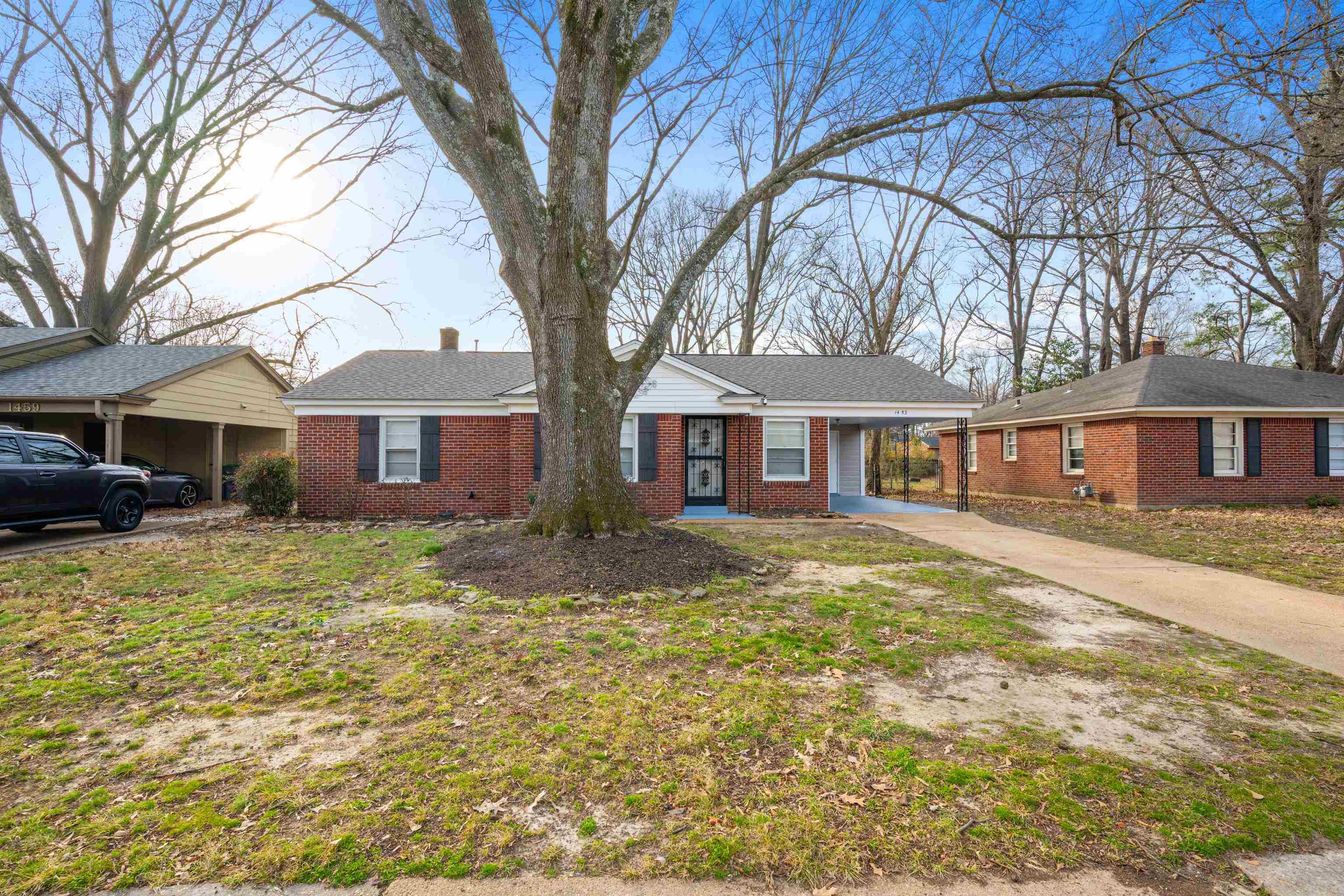 1453 Colonial Road Memphis, TN 38117 - Photo 28 of 36 a front view of a house with a yard