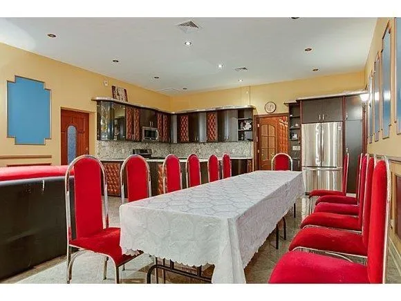 a bed room with a bed and a television