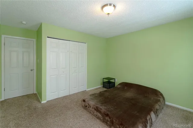 a room with a bed and a table