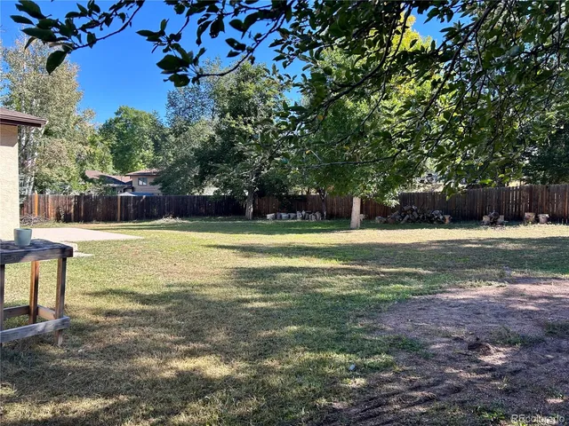 a view of swimming pool with an outdoor space and seating area