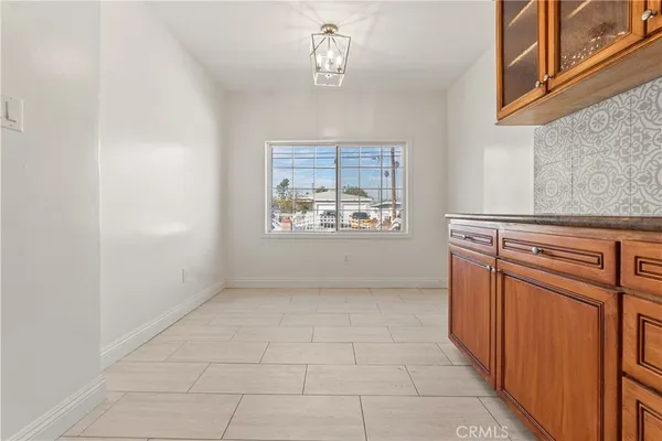 a view of a kitchen with a sink