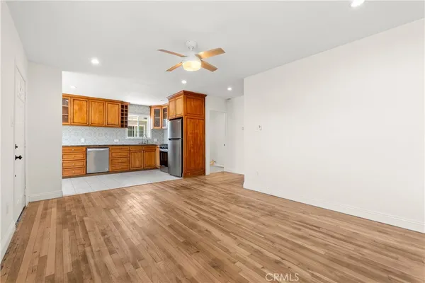 a kitchen with stainless steel appliances granite countertop a stove and a sink