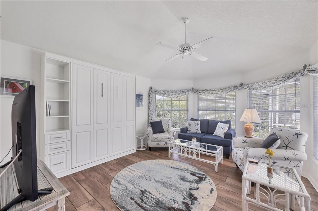 11 Amberjack Lane Placida, FL 33946 - Photo 13 of 46 a living room with furniture and a flat screen tv
