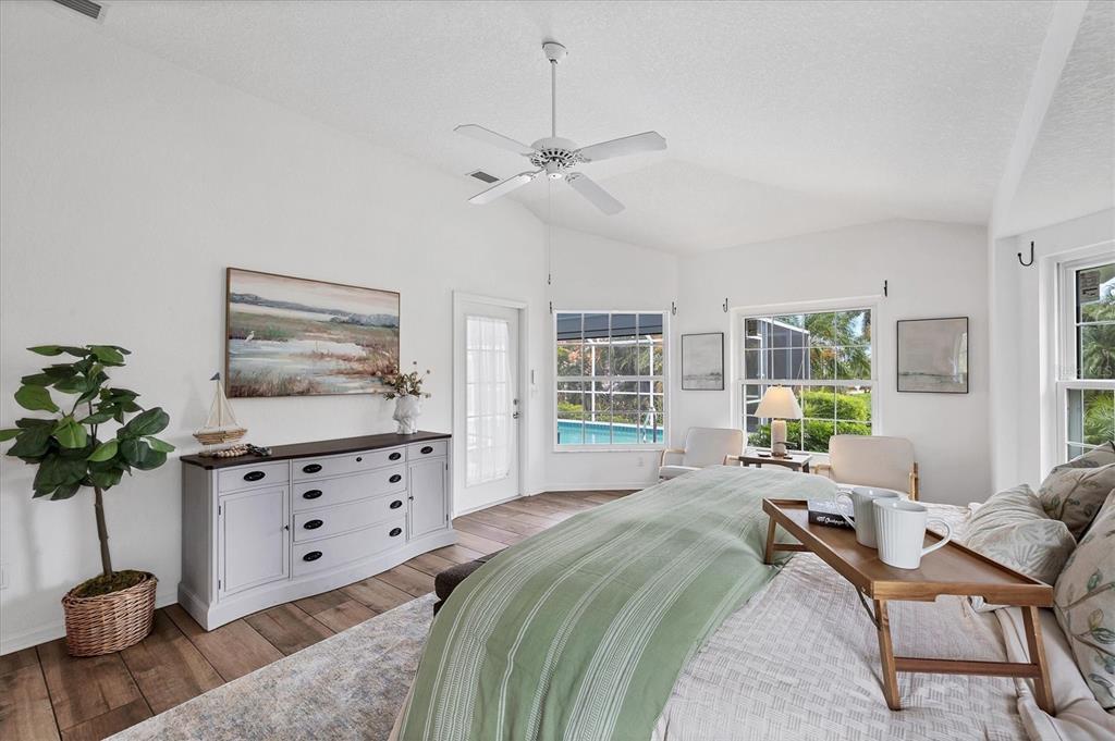 11 Amberjack Lane Placida, FL 33946 - Photo 21 of 46 a bedroom with furniture and a window