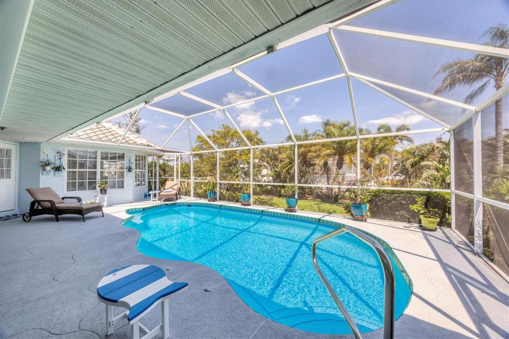 11 Amberjack Lane Placida, FL 33946 - Photo 33 of 46 a view of a chairs and table in the patio