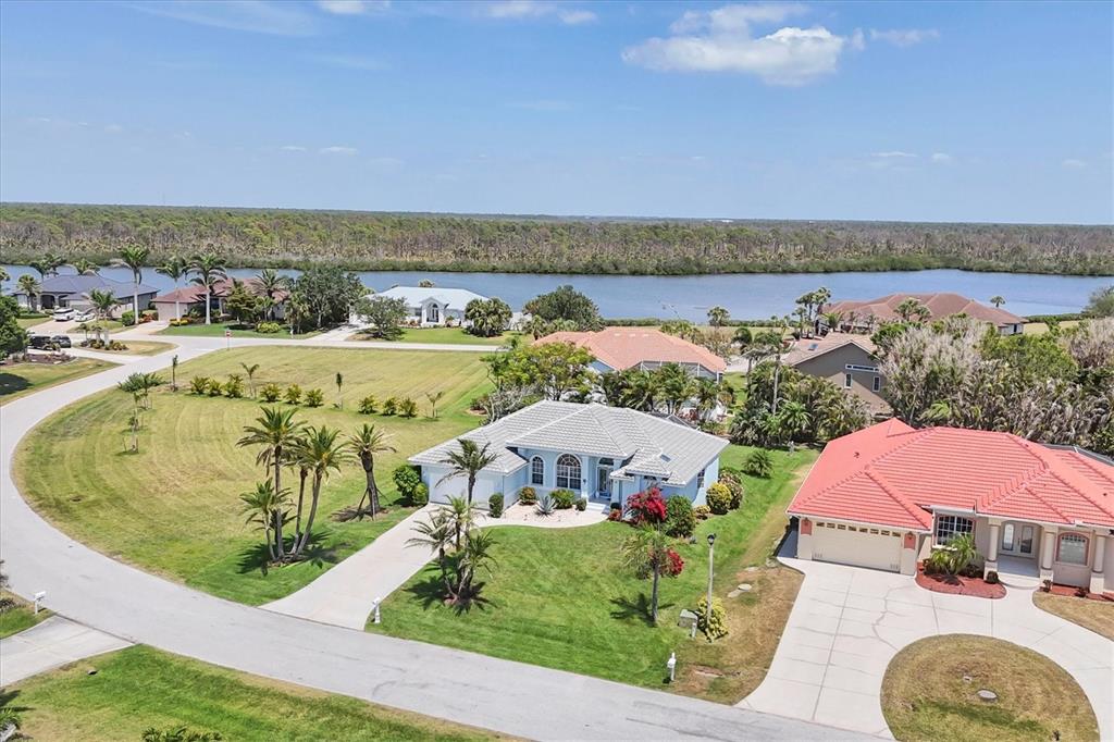 11 Amberjack Lane Placida, FL 33946 - Photo 46 of 46 an aerial view of a house with a garden and lake view