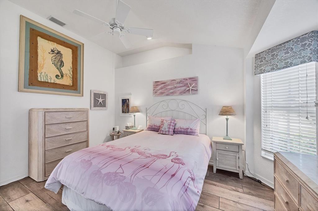 11 Amberjack Lane Placida, FL 33946 - Photo 7 of 46 a bedroom with a bed and a window