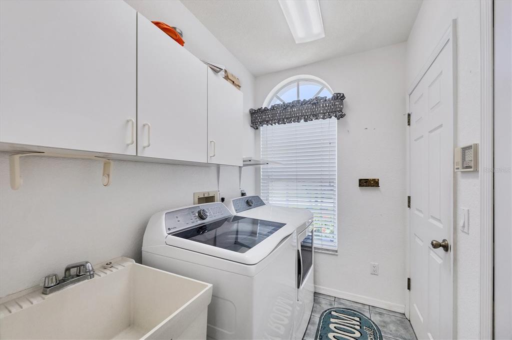 11 Amberjack Lane Placida, FL 33946 - Photo 8 of 46 a bathroom with a sink and cabinets