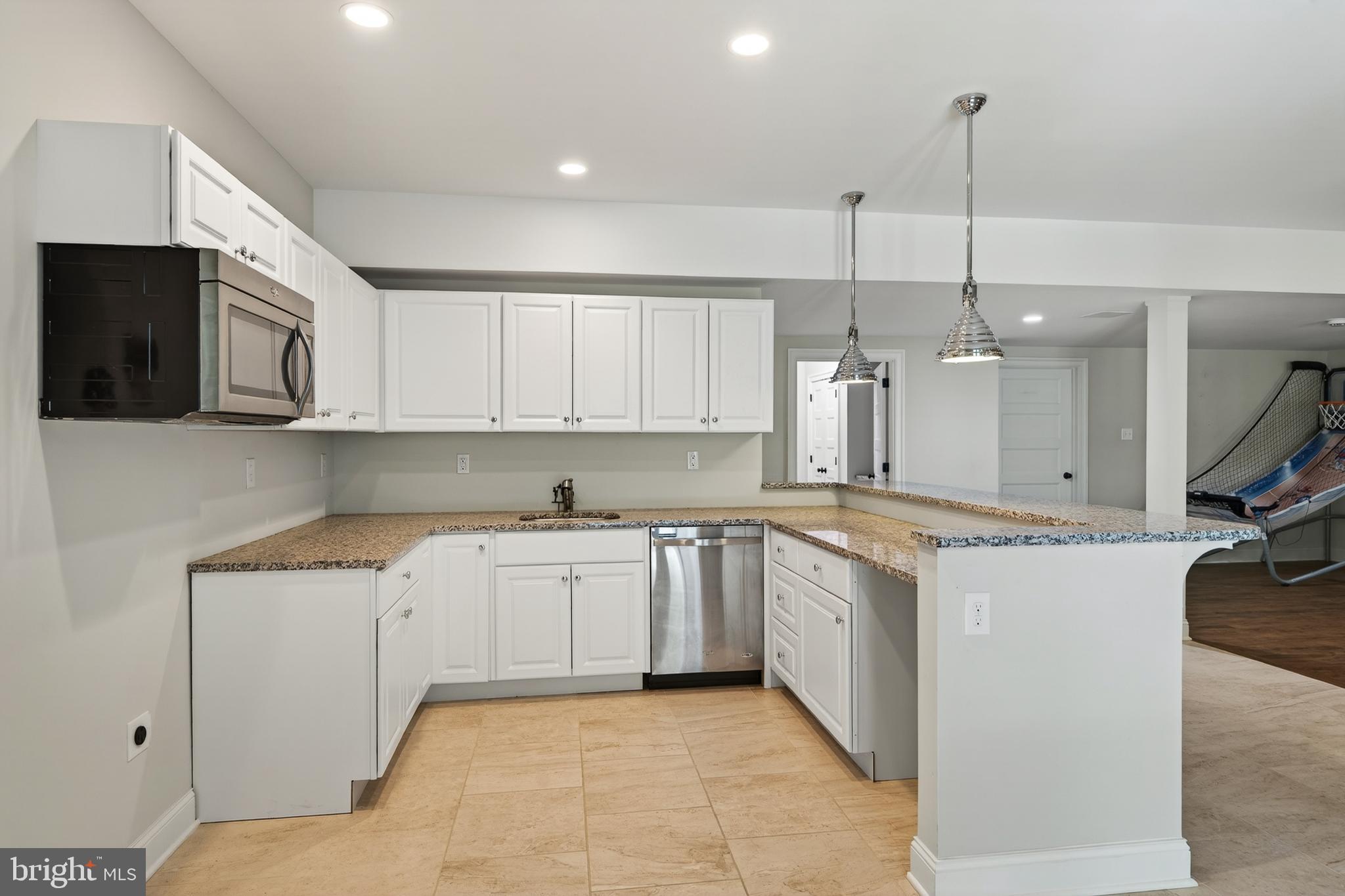 57 Sweetwater Road Glen Mills, PA 19342 - Photo 82 of 106 Lower Level Kitchen/Bar w dishwasher