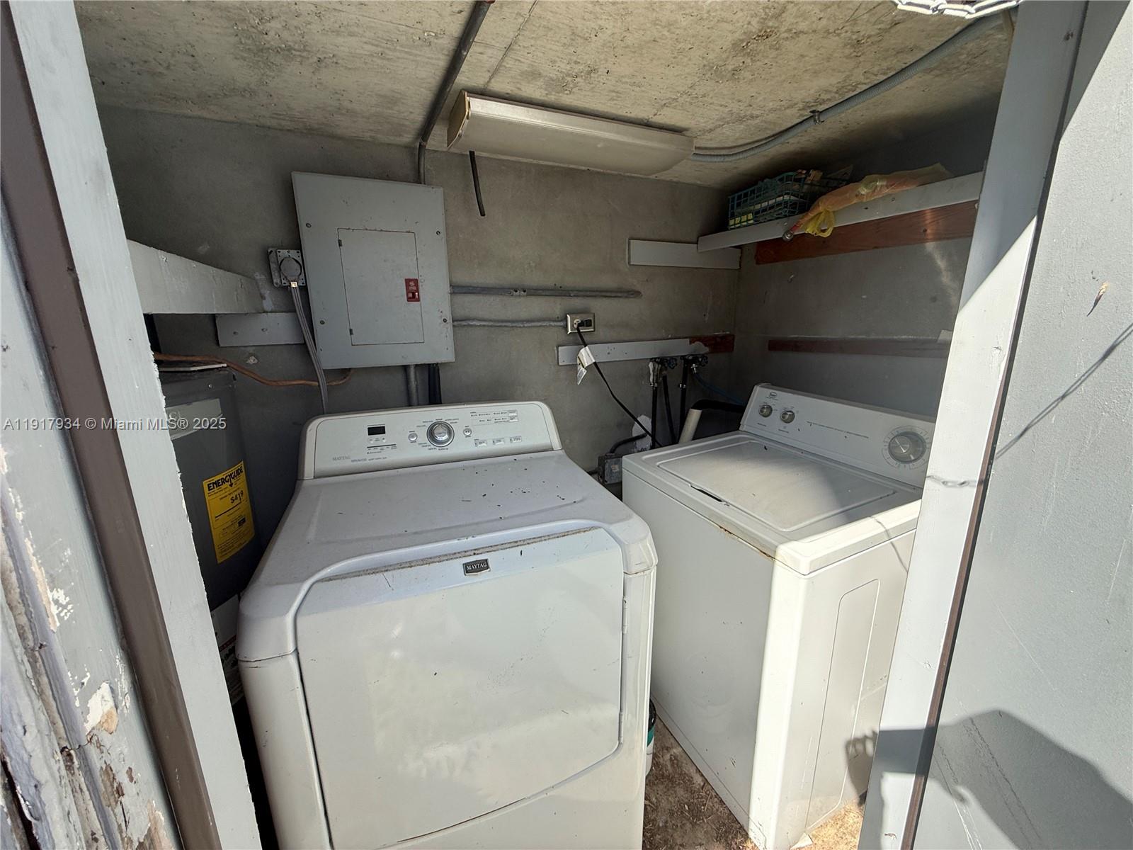 521 Southwest 9th Street, Unit 2 Hallandale Beach, FL 33009 - Photo 7 of 10 a utility room with dryer and washer