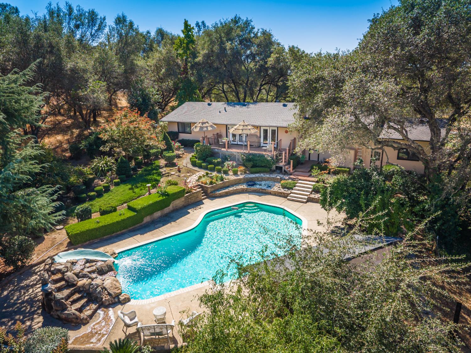 8065 Rock Springs Road Penryn, CA 95663 - Photo 3 of 89 Saltwater pool with slide and waterfall.